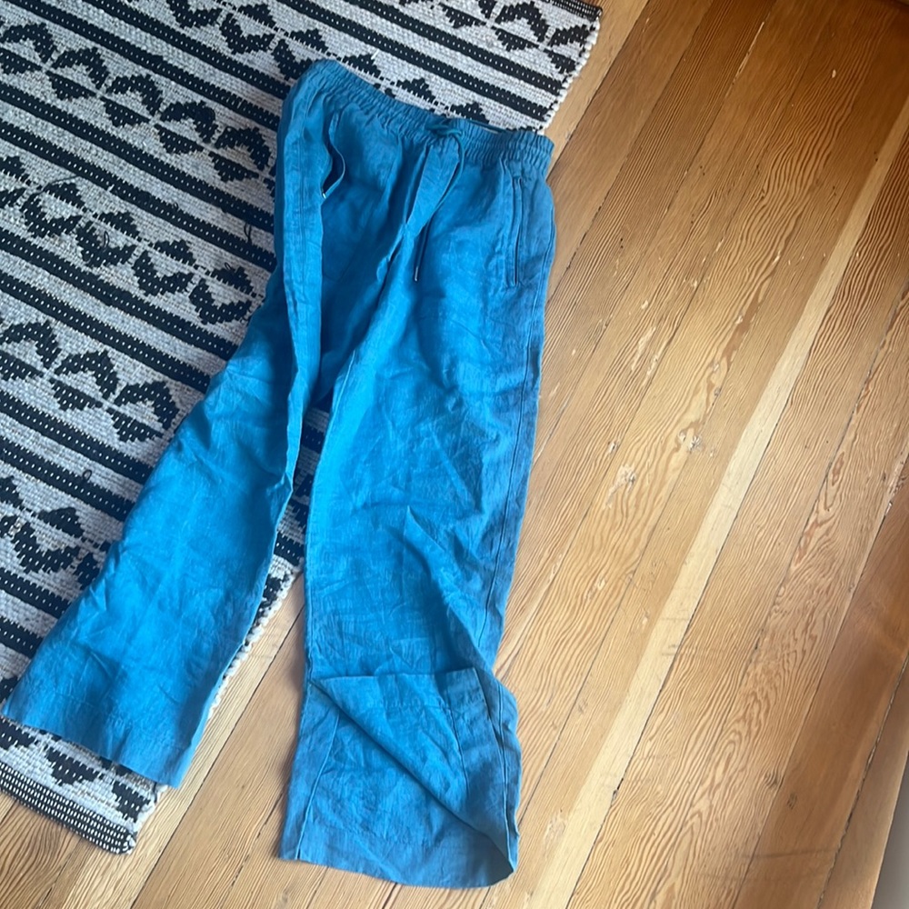 Athleta Cabo wide leg blue teal linen pants.